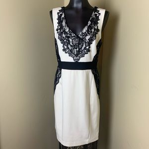 Jennifer Lopez cream w/ black lace dress size 12.